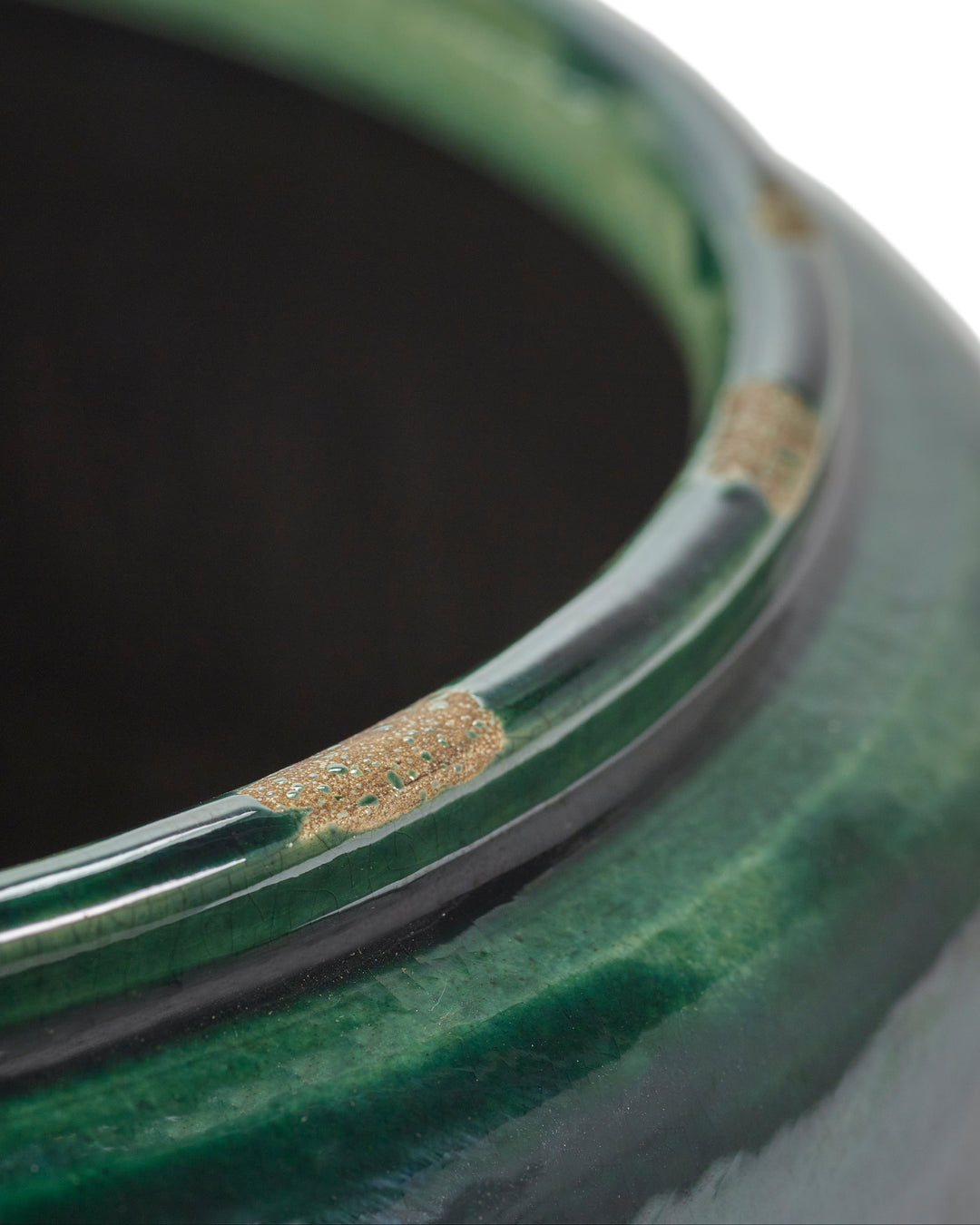Glazed round pot in green, detail