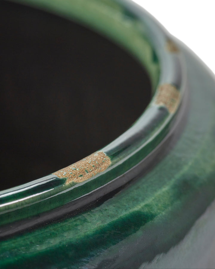 Glazed round pot in green, detail