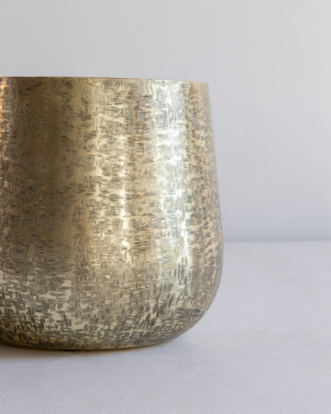 Hand-hammered gold planter, detail