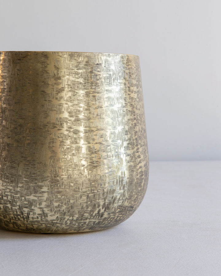 Hand-hammered gold planter, detail